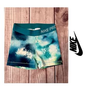 Women’s Nike Pro splatter Dri-Fit shorts. Small. Blue, white, yellow, black.